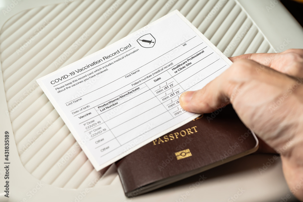 Covid-19 vaccination record card and passport Covid-19 vaccination record card and passport