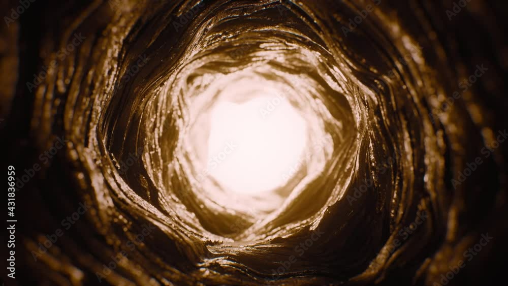Dark Mystic Cave. Light at the end of the round tunnel. Looped video.