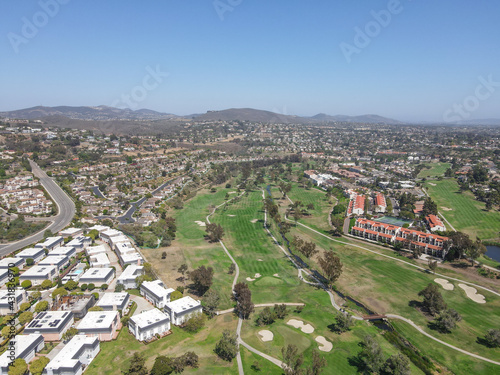 Aerial view of houses and condos with golf in Carlsbad, North County San Diego, California, USA.