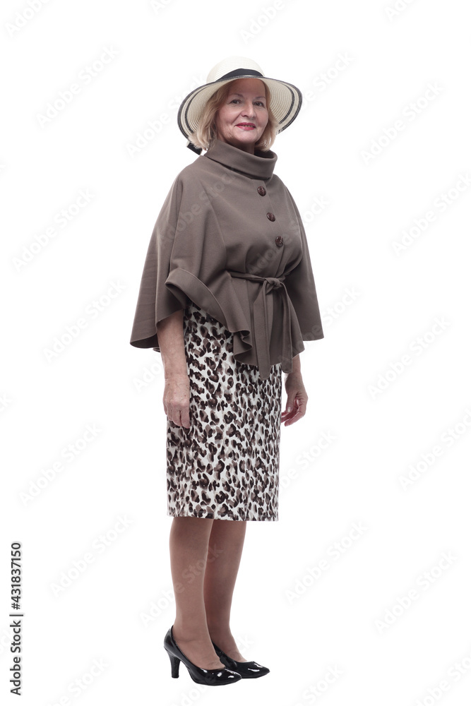 in full growth. attractive mature woman in a summer hat. in full growth. attractive mature woman in a summer hat.