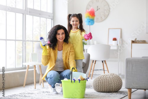 Mother and daughter cleanin...
