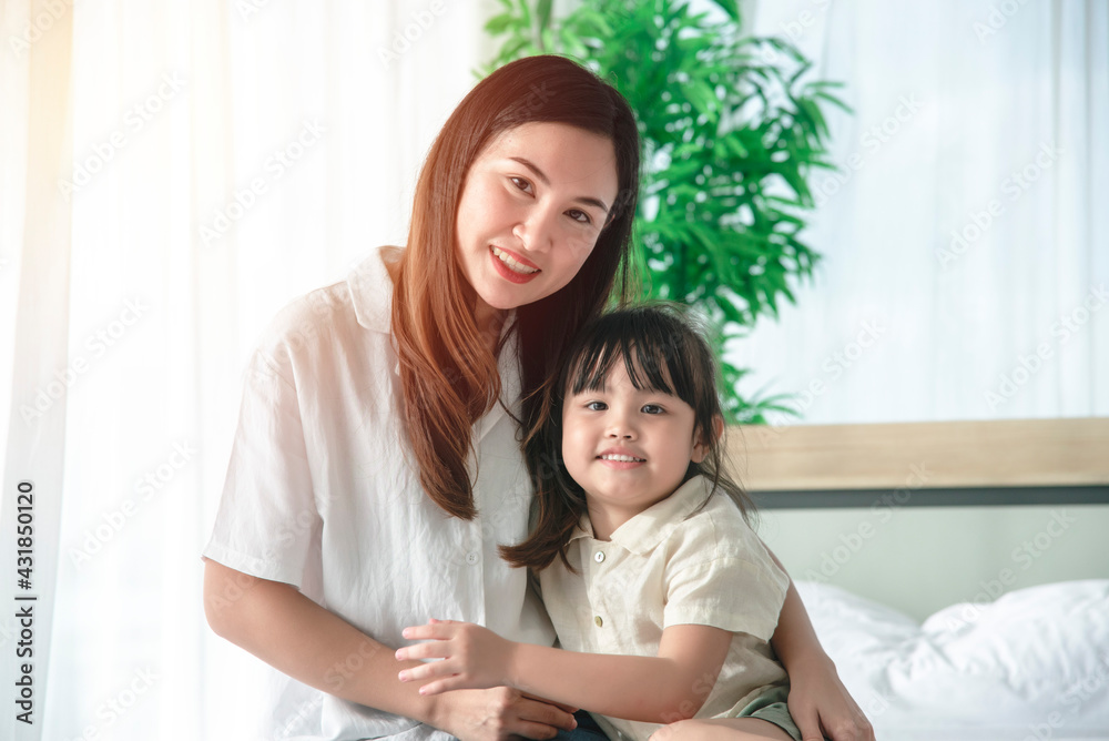 Kid is learning to understand tutoring with her home mom, feeling happy at her home away from COVID-19 Kid is learning to understand tutoring with her home mom, feeling happy at her home away from COVID-19