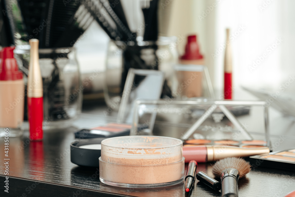 Make up products on vanity table close up Make up products on vanity table close up
