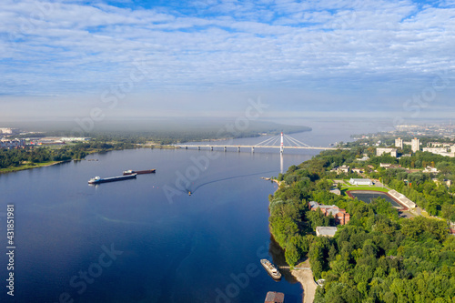 Aerial view of Oktyabrsky bridge across Sheksna river on sunny summer day. Cherepovets, Vologda Oblast, Russia. photo