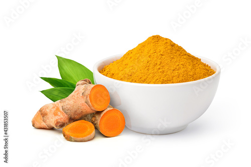 Finely dry Turmeric (Curcuma longa Linn) powder in white bowl with  rhizome (root) sliced isolated on white background. photo