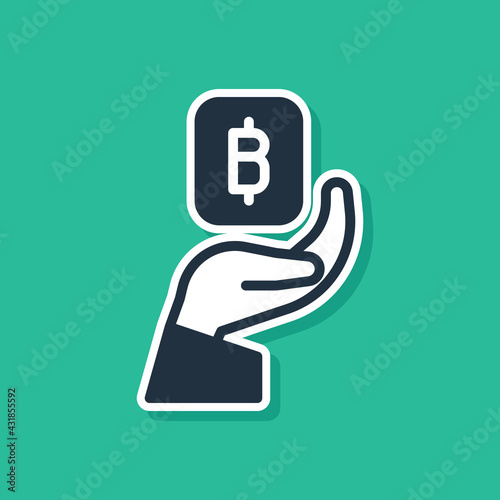 Blue Hand holding Bitcoin icon isolated on green background. Blockchain technology, digital money market, cryptocoin wallet. Vector