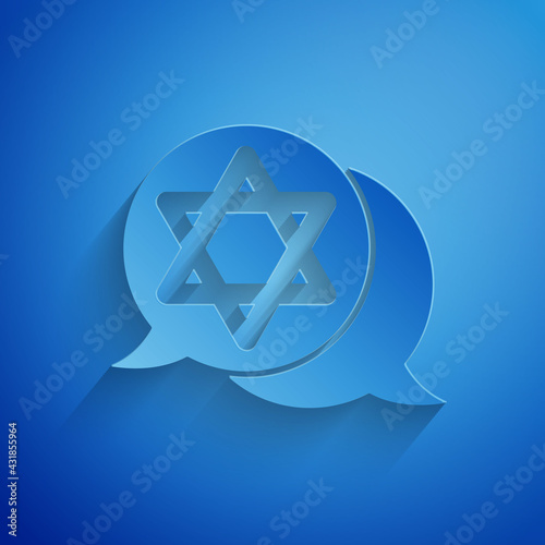 Paper cut Star of David icon isolated on blue background. Jewish religion symbol. Symbol of Israel. Paper art style. Vector