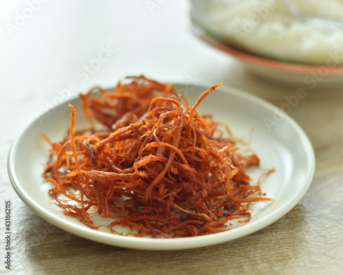 Crispy dried shredded pork on white background.