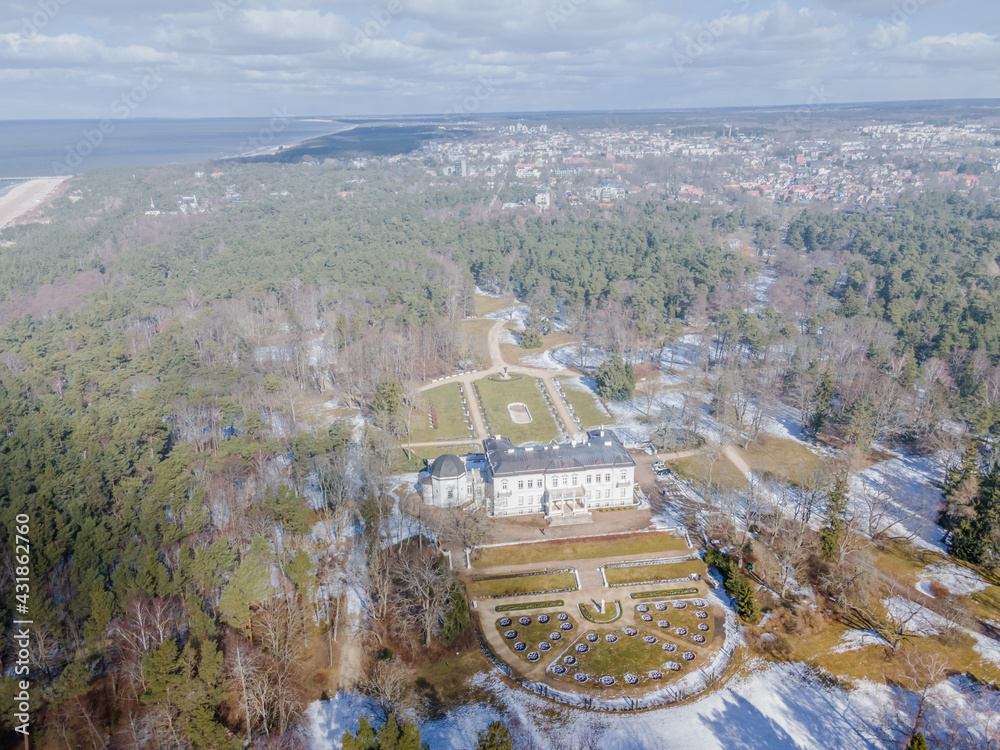 Aerial winter view of Palanga city park, with Amber museum in it. Park located on the coastline of Baltic sea