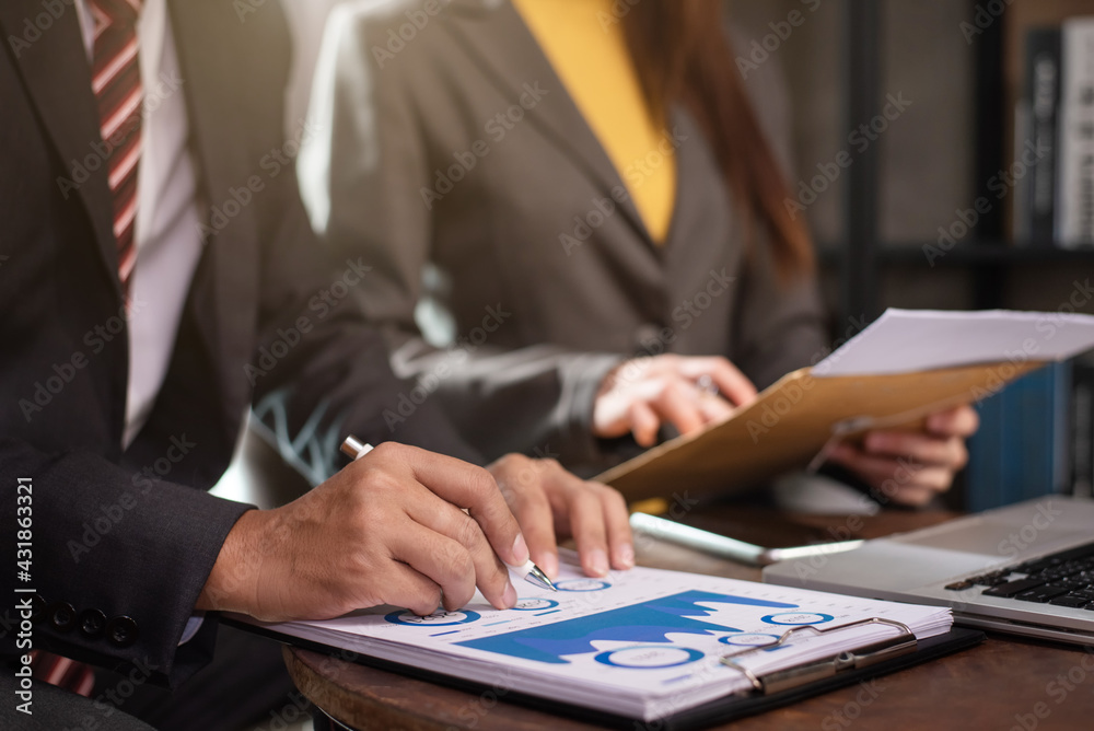 Business people discussing on performance revenue in meeting. businessman working with co-worker team. financial adviser analyzing data with investor at home office. Business people discussing on performance revenue in meeting. businessman working with co-worker team. financial adviser analyzing data with investor at home office.