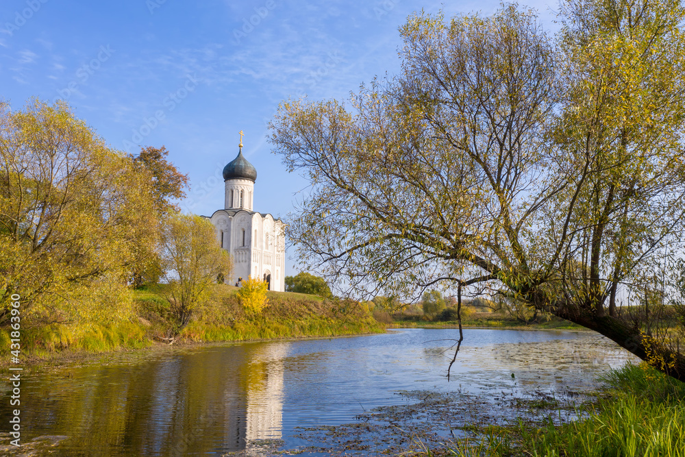 View of Church of the Intercession on the Nerl (Pokrova na Nerli, XII century) on sunny autumn day. Vladimir Oblast, Russia. View of Church of the Intercession on the Nerl (Pokrova na Nerli, XII century) on sunny autumn day. Vladimir Oblast, Russia.