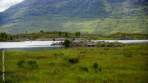 Highlands in Schottland mit Seeen und saftigen Wiesen entlang der Straße A87 photo