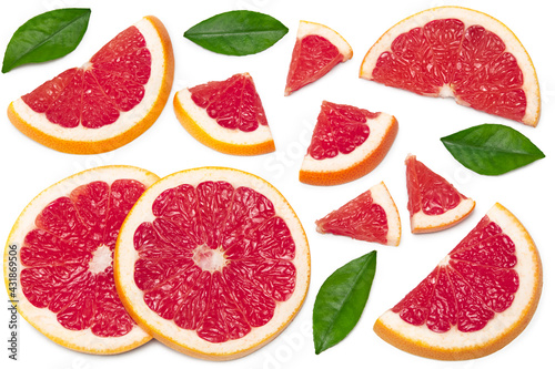 grapefruit with slices and green leaves isolated on white background top view. clipping path