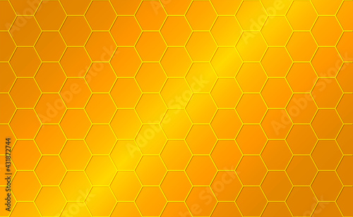 Abstract yellow background with geometric pattern in the form of honeycombs.