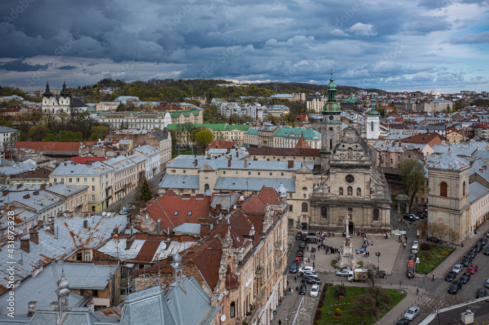 Lviv, Ukraine - May 1, 2021: view on Bernardine church in Lviv from drone.  Consecration of Easter food, cakes, eggs