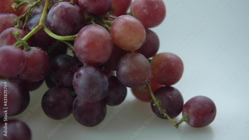 Panning shot fresh seedless grapes. Slow motion shot Panning shot fresh seedless grapes. Slow motion shot