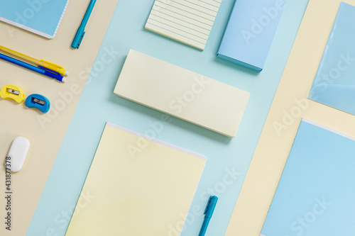 Foto Stationary school supplies in yellow and blue tone