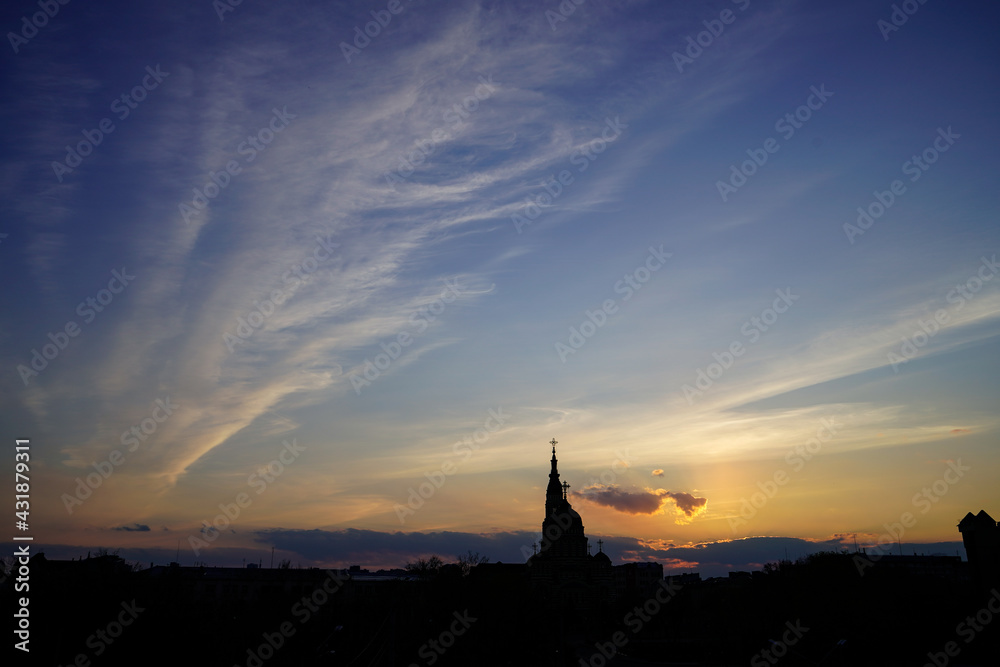 sunset over the church