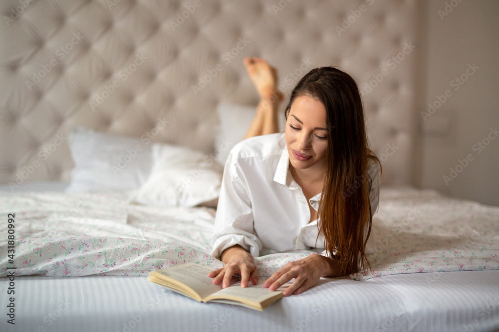 Smiling sexy woman in pajamas enjoying weekend at home Smiling sexy woman in pajamas enjoying weekend at home