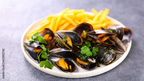 plate with mussel and french fries