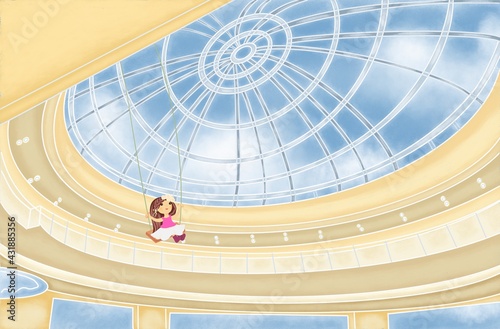 A lovely little girl swinging under the glass dome