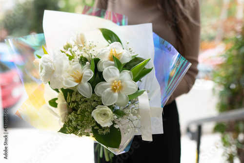 bouquet of tulips, bouquet of red tulips, bouquet of curly tulips,bouquet of white tulips. photo