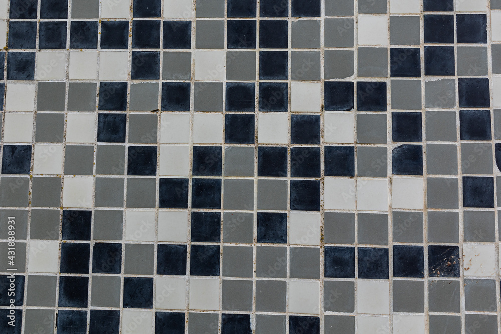  black and white background made of small square ceramic glaze tiles