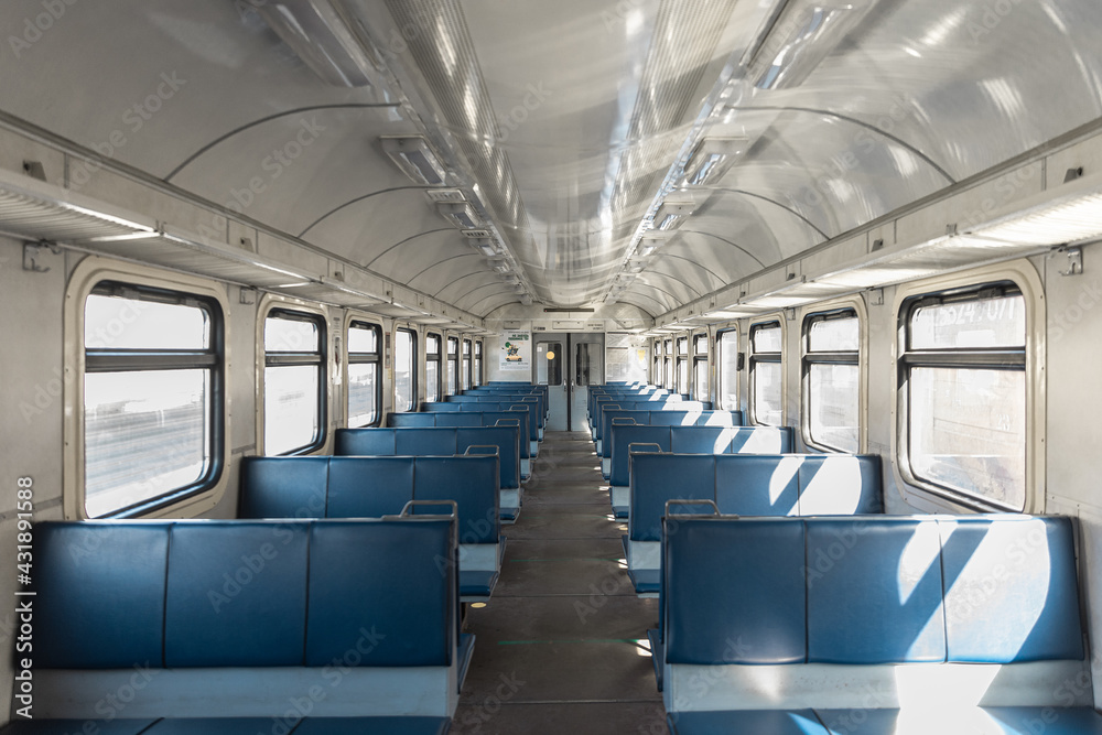 Fototapeta premium electric train without people with blue seats