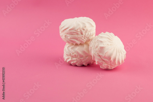 Russian marshmallow Zefir on pink paper background