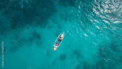 Tourist sail kayak on the sea, with top view from drone.