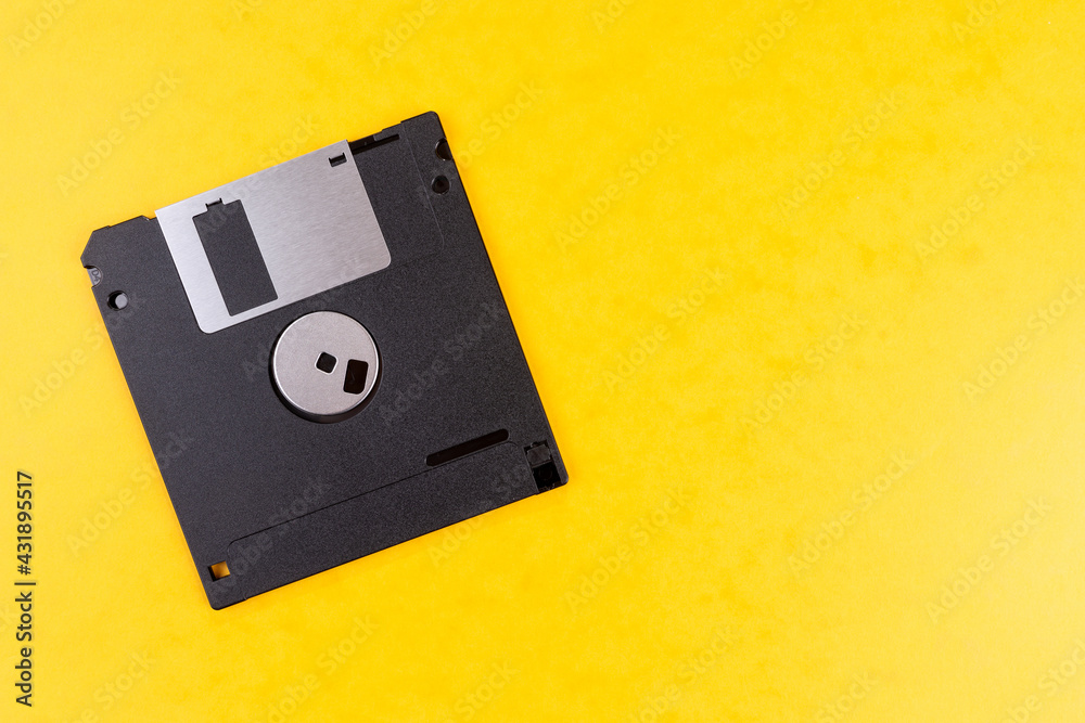Floppy disk isolated on yellow background. Retro computer diskette Floppy disk isolated on yellow background. Retro computer diskette