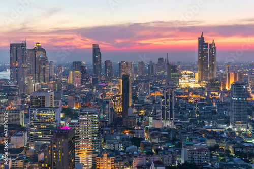 Sunset panorama aerial view in the middle of Bangkok cityscape skyline .Night scene before sunrise , Thailand.