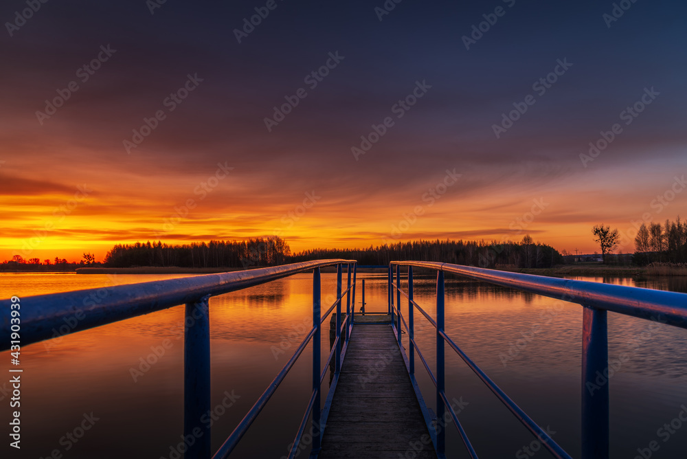 a beautiful sunrise on the lake shore in eastern Poland and a wonderful sky full of colors