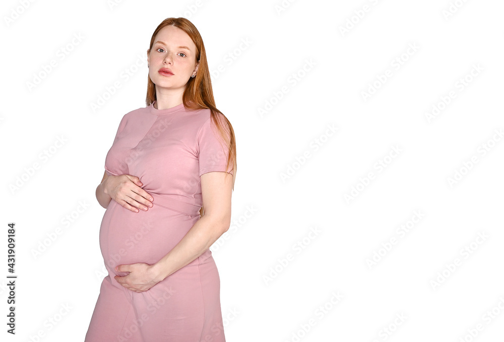 Pregnant redhead girl on white background