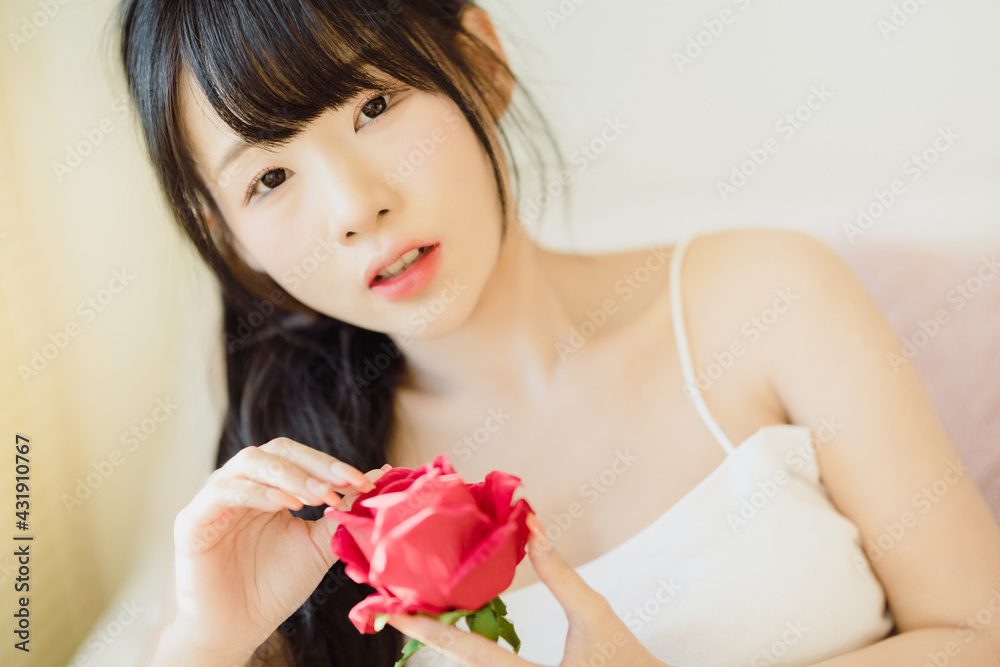 Headshot portrait of young asian woman sexy girl with long hair using as background cosmetics woman makeup fashion people model