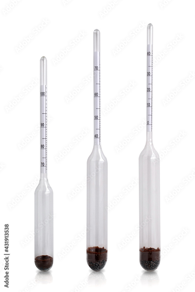 Professional glass alcohol meters, isolated on a white background. To measure the strength of alcohol with a measurement interval from 0 to 100 degrees. Professional glass alcohol meters, isolated on a white background. To measure the strength of alcohol with a measurement interval from 0 to 100 degrees.