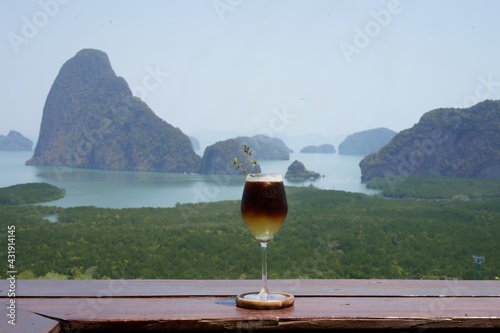 glass of wine as coffee on the beach