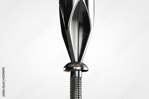 Tightening the screw with a screwdriver. Close-up