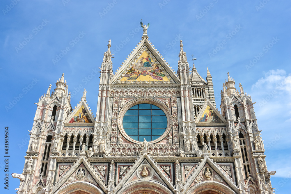 Siena, Italy. Beautiful view of Siena Cathedral (Duomo di Siena) in sunny day.