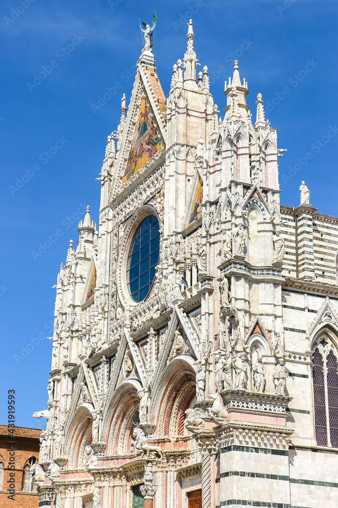 Siena, Italy. Beautiful view of Siena Cathedral (Duomo di Siena) in sunny day.