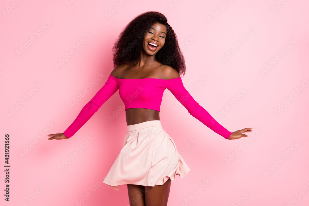 Photo of optimistic brunette nice lady dance wear pink top skirt isolated on pastel color background Photo of optimistic brunette nice lady dance wear pink top skirt isolated on pastel color background