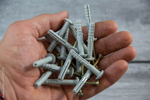 A pile of dowel nails in your hand.