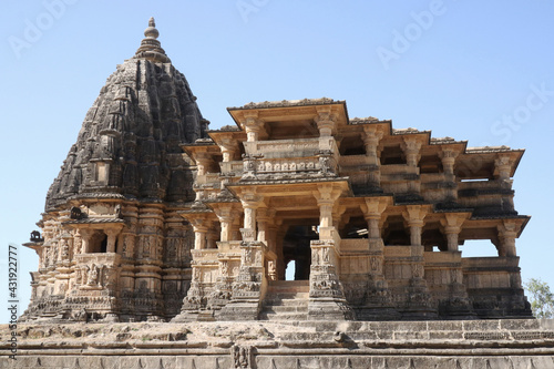 Kandariya Mahadev Temple of Khajuraho against the clear blue sky in summer photo