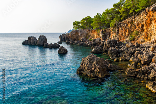 blue bay among rocky mountains on a summer day