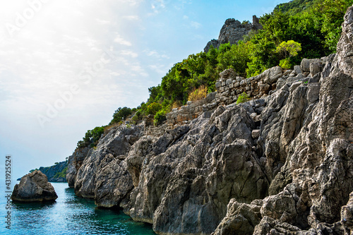 blue bay among rocky mountains on a summer day