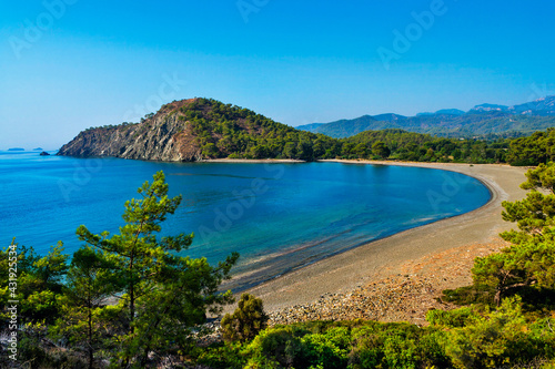 blue bay among rocky mountains on a summer day
