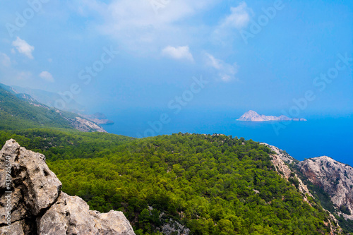 blue bay among rocky mountains on a summer day