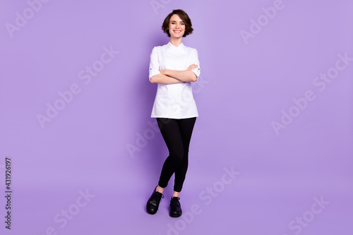 Full length body size view of attractive cheerful content girl folded arms posing isolated over bright violet purple color background