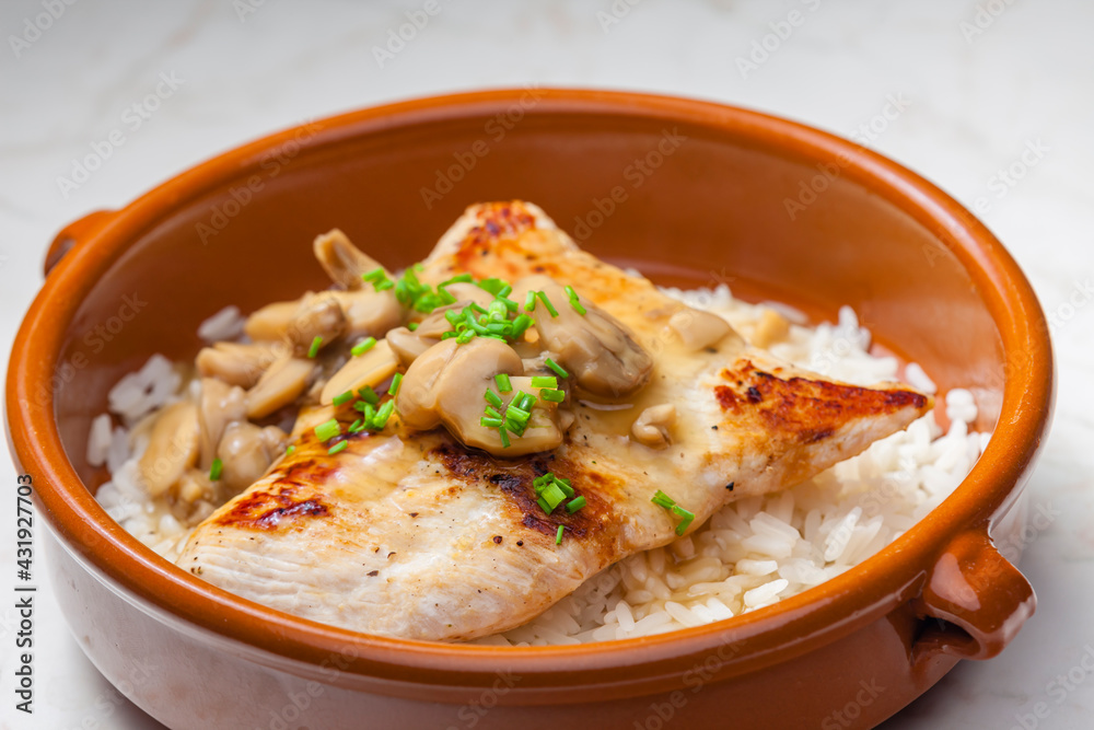 grilled turkey fillet with mushroom sauce and rice