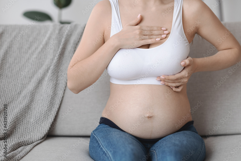 Breast Diseases During Pregnancy. Pregnant Lady In Top Bra Massaging Chest Area Breast Diseases During Pregnancy. Pregnant Lady In Top Bra Massaging Chest Area
